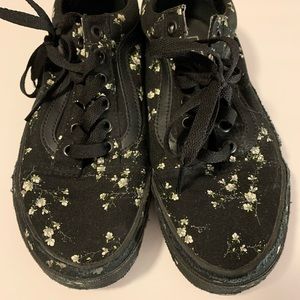Women’s Van’s “off the wall” black shoes with flower design
